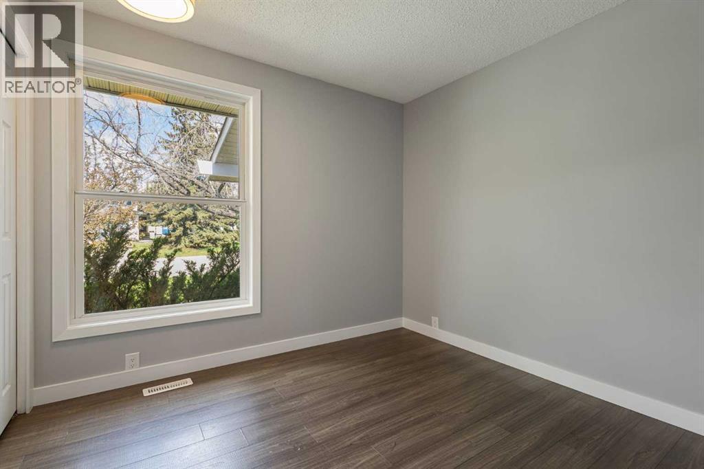 5876 Dalcastle Drive NW, Calgary, Alberta  T3A 2B6 - Photo 22 - A2313700