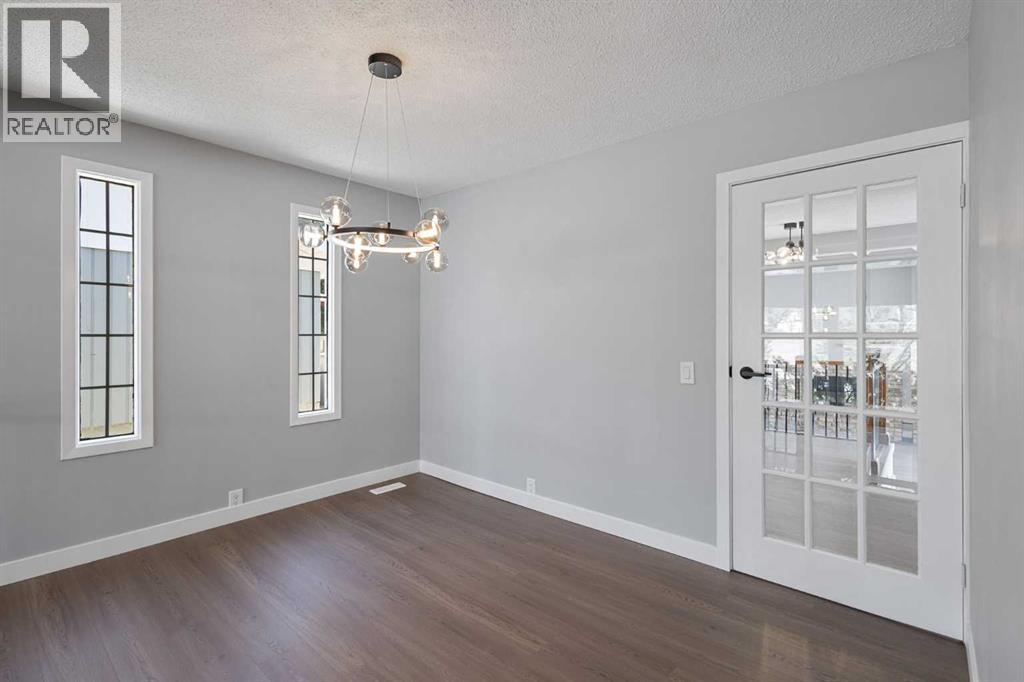 5876 Dalcastle Drive NW, Calgary, Alberta  T3A 2B6 - Photo 7 - A2313700