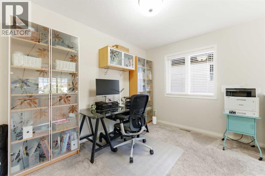 74 Evercreek Bluffs Road SW, Calgary, Alberta  T2Y 4P2 - Photo 21 - A2313689
