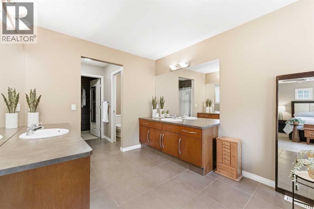 39 Evercreek Bluffs Road SW, Calgary, Alberta  T2Y 4P3 - Photo 35 - A2312372