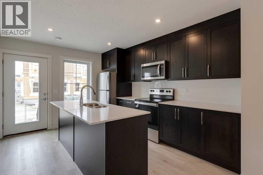 207, 40 Livingston Parade NE, Calgary, Alberta  T4B 3P6 - Photo 3 - A2313557