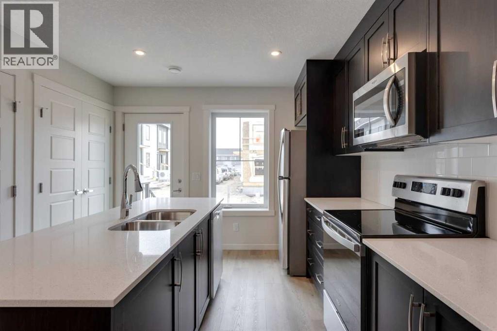 207, 40 Livingston Parade NE, Calgary, Alberta  T4B 3P6 - Photo 5 - A2313557