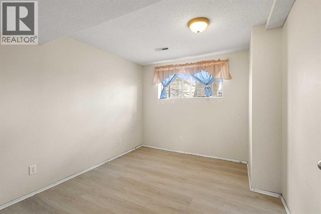 214 Huntington Close NE, Calgary, Alberta  T2K 5B2 - Photo 22 - A2299935