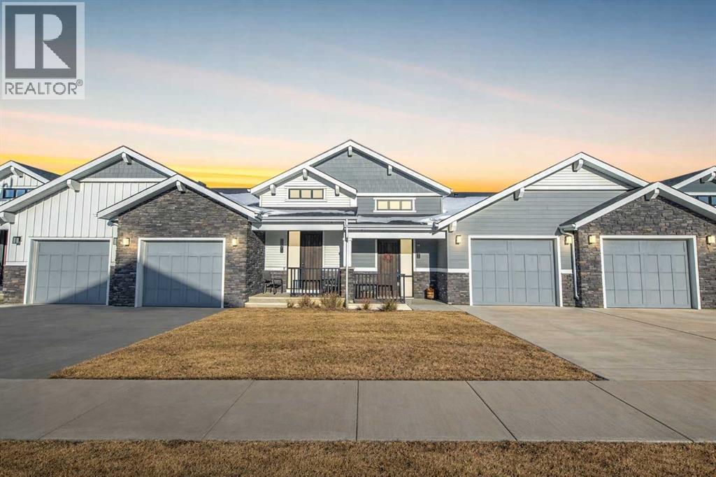 12572 Crestmont Boulevard SW, Calgary, Alberta  T3B 6J5 - Photo 1 - A2291827