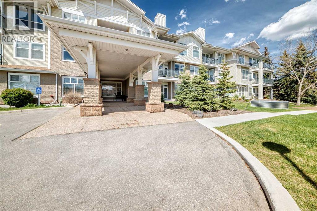1209, 1010 Arbour Lake Road NW, Calgary, Alberta  T3G 4Y8 - Photo 2 - A2313903