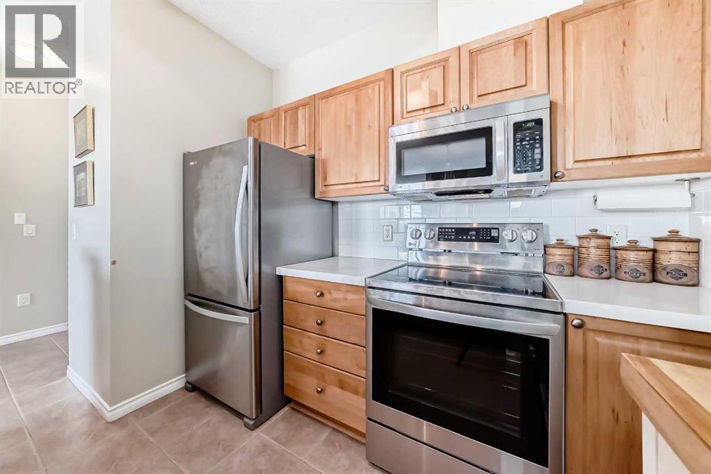 1209, 1010 Arbour Lake Road NW, Calgary, Alberta  T3G 4Y8 - Photo 7 - A2313903
