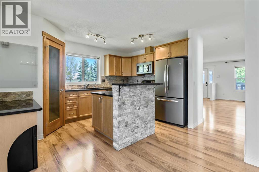 14 Crystal Shores Hill, Okotoks, Alberta  T1S 2H7 - Photo 12 - A2311680