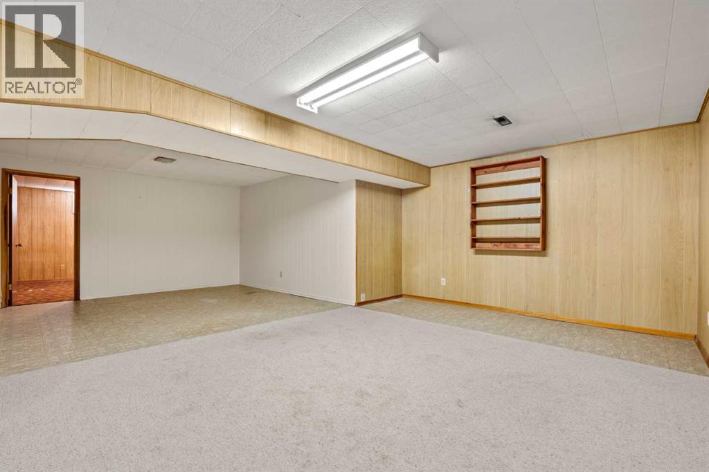 5220 Grove Hill Road SW, Calgary, Alberta  T3E 4G6 - Photo 28 - A2307839