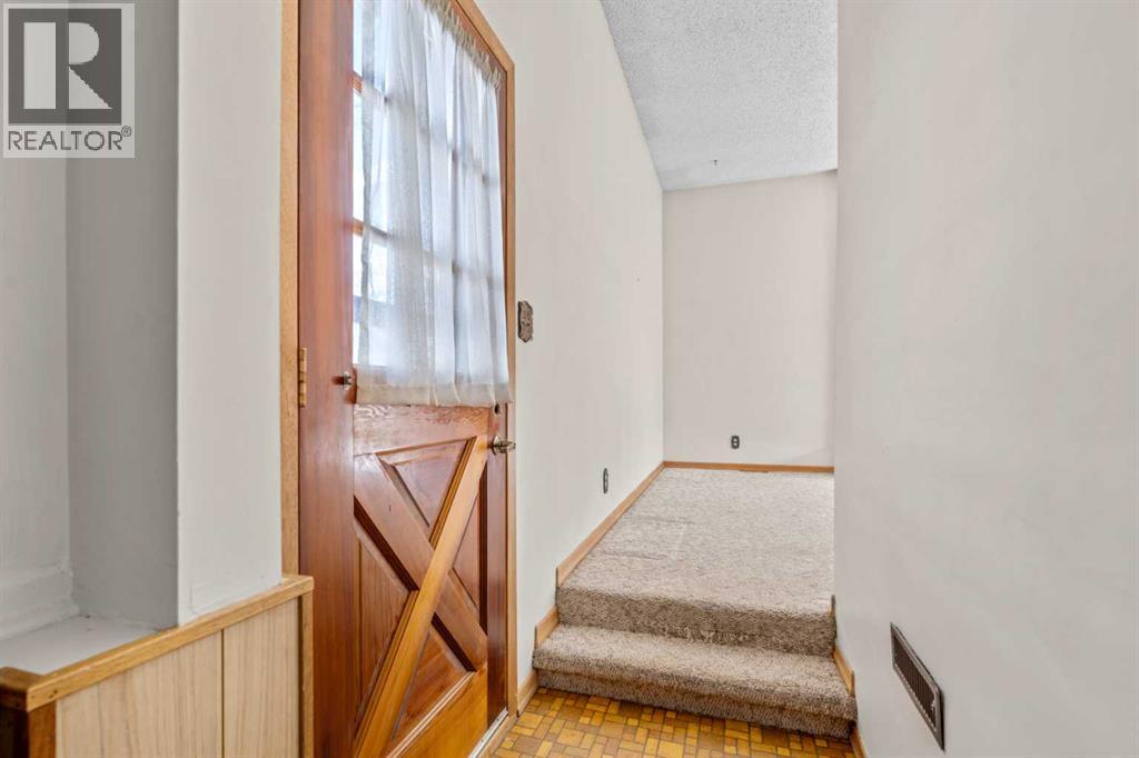 5220 Grove Hill Road SW, Calgary, Alberta  T3E 4G6 - Photo 24 - A2307839
