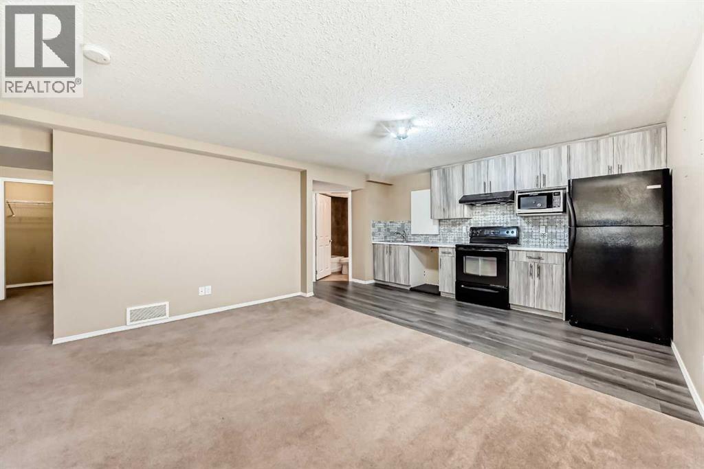 2128 Luxstone Boulevard SW, Airdrie, Alberta  T4B 0C6 - Photo 29 - A2303539
