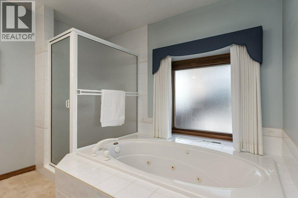 152 Coach Grove Place SW, Calgary, Alberta  T3H 1J2 - Photo 19 - A2311820