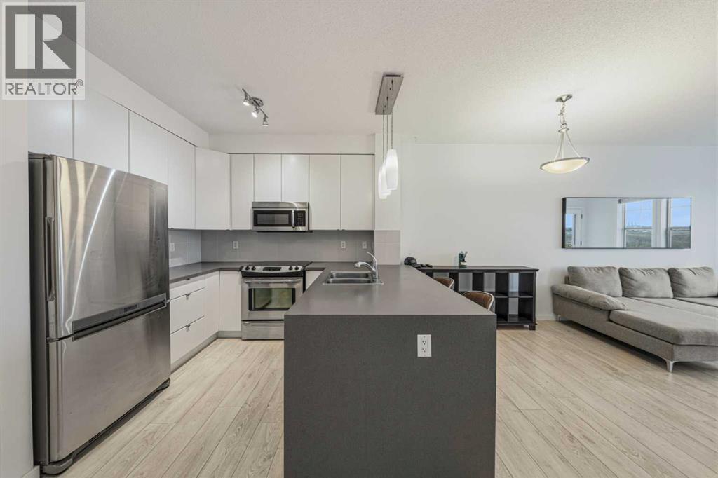 404, 207 Sunset Drive, Cochrane, Alberta  T4C 0H7 - Photo 2 - A2312696