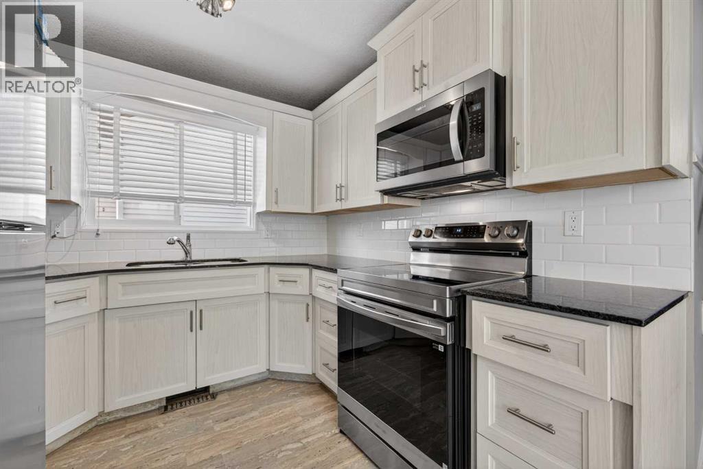 84 Macewan Glen Way NW, Calgary, Alberta  T2K 2G7 - Photo 19 - A2307010