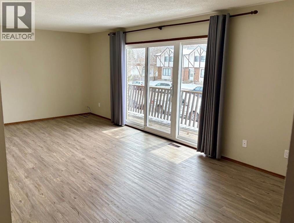 4828 Varsity Drive NW, Calgary, Alberta  T3A 1A3 - Photo 3 - A2310800