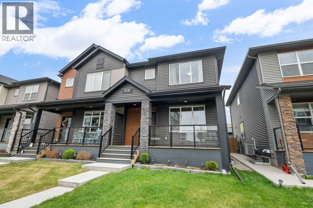 315 Wolf Creek Way SE, Calgary, Alberta  T2X 4y8 - Photo 2 - A2311450
