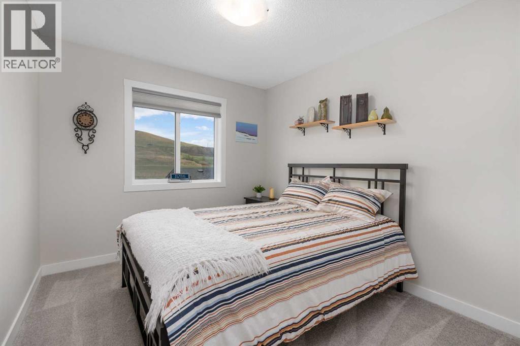 315 Wolf Creek Way SE, Calgary, Alberta  T2X 4y8 - Photo 18 - A2311450