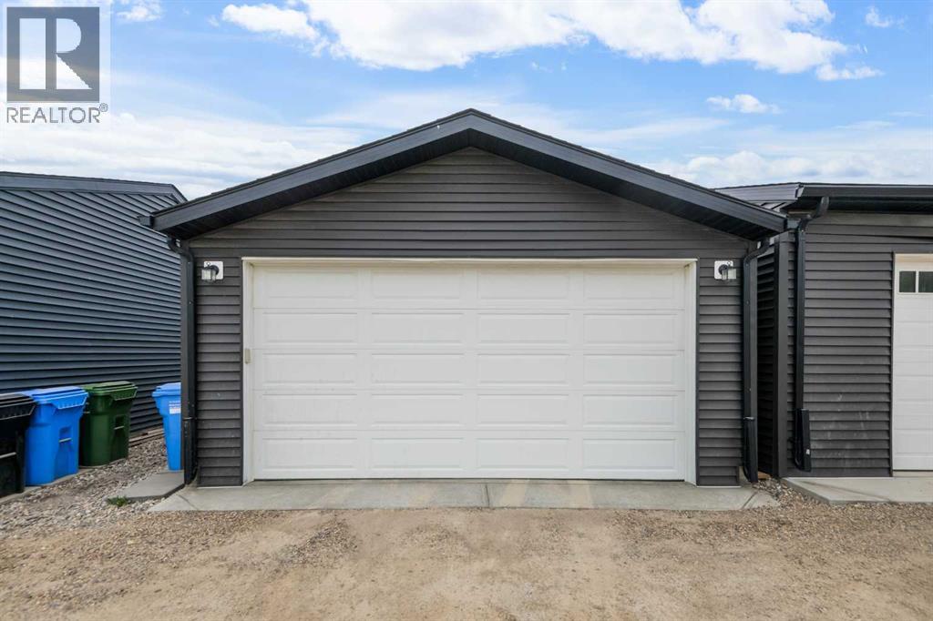 315 Wolf Creek Way SE, Calgary, Alberta  T2X 4y8 - Photo 44 - A2311450