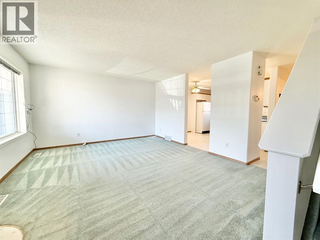 5 Garrow Crescent E, Brooks, Alberta  T1R 1H2 - Photo 13 - A2288196