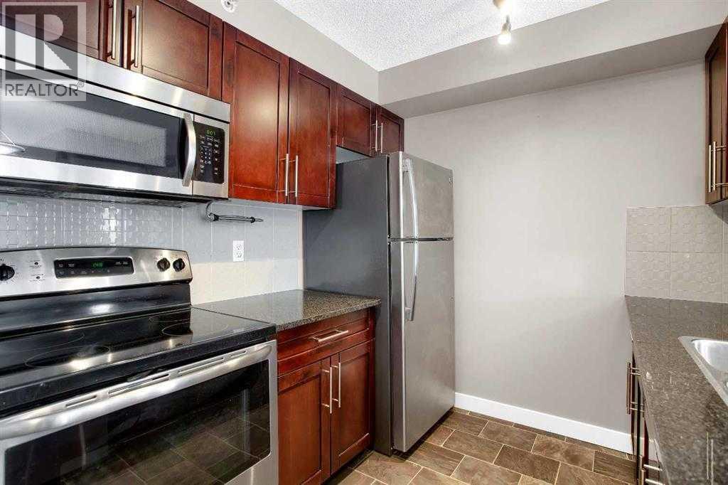 9407, 403 Mackenzie Way SW, Airdrie, Alberta  T4B 3V7 - Photo 3 - A2293383