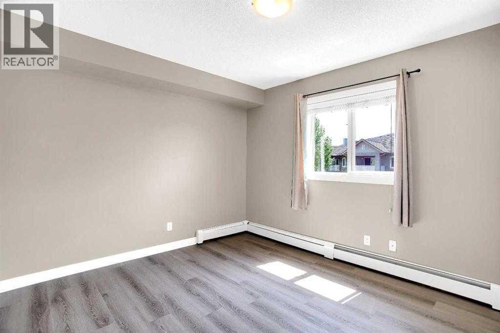 9407, 403 Mackenzie Way SW, Airdrie, Alberta  T4B 3V7 - Photo 16 - A2293383