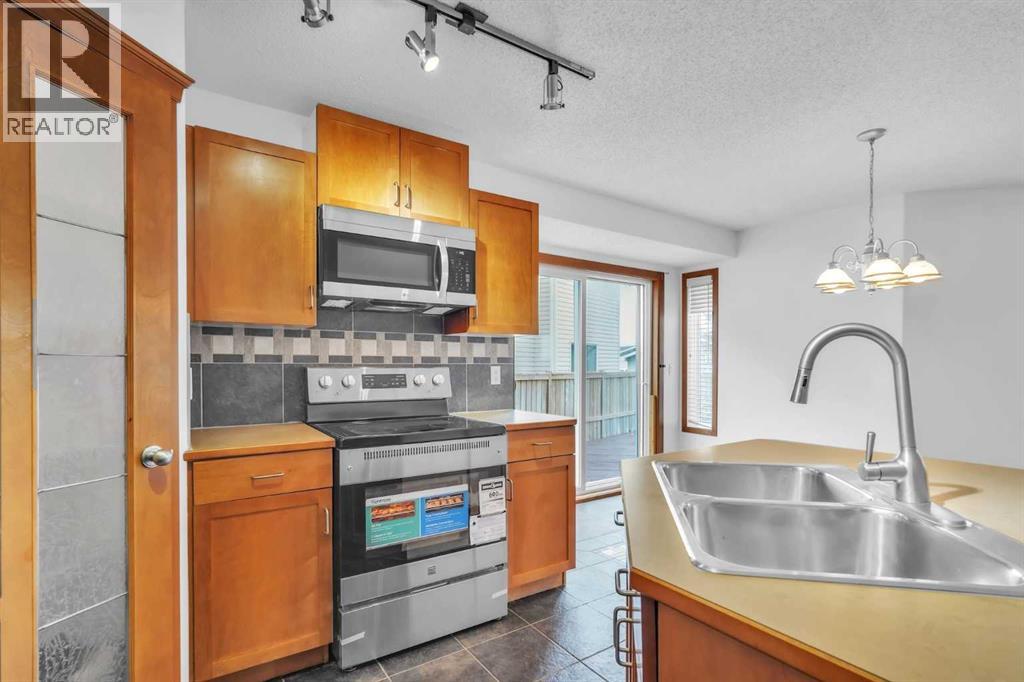 141 Cramond Close SE, Calgary, Alberta  T3M 1C2 - Photo 5 - A2312591
