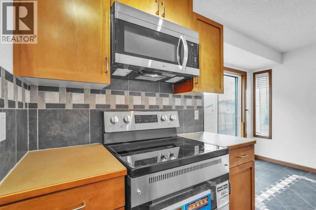 141 Cramond Close SE, Calgary, Alberta  T3M 1C2 - Photo 6 - A2312591