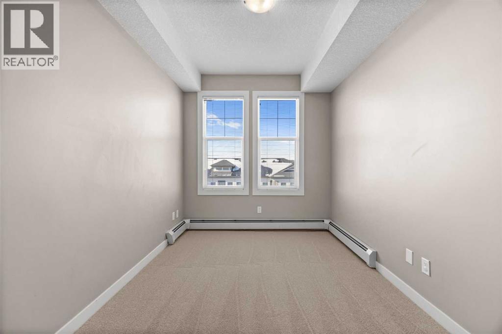 407, 2300 Evanston Square NW, Calgary, Alberta  T3P 0G8 - Photo 23 - A2302585