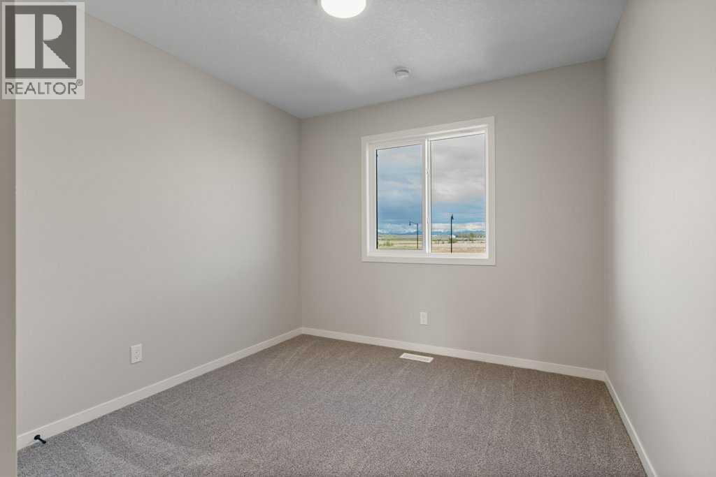 123 Montane Link SE, High River, Alberta  T1V 0K8 - Photo 21 - A2314022