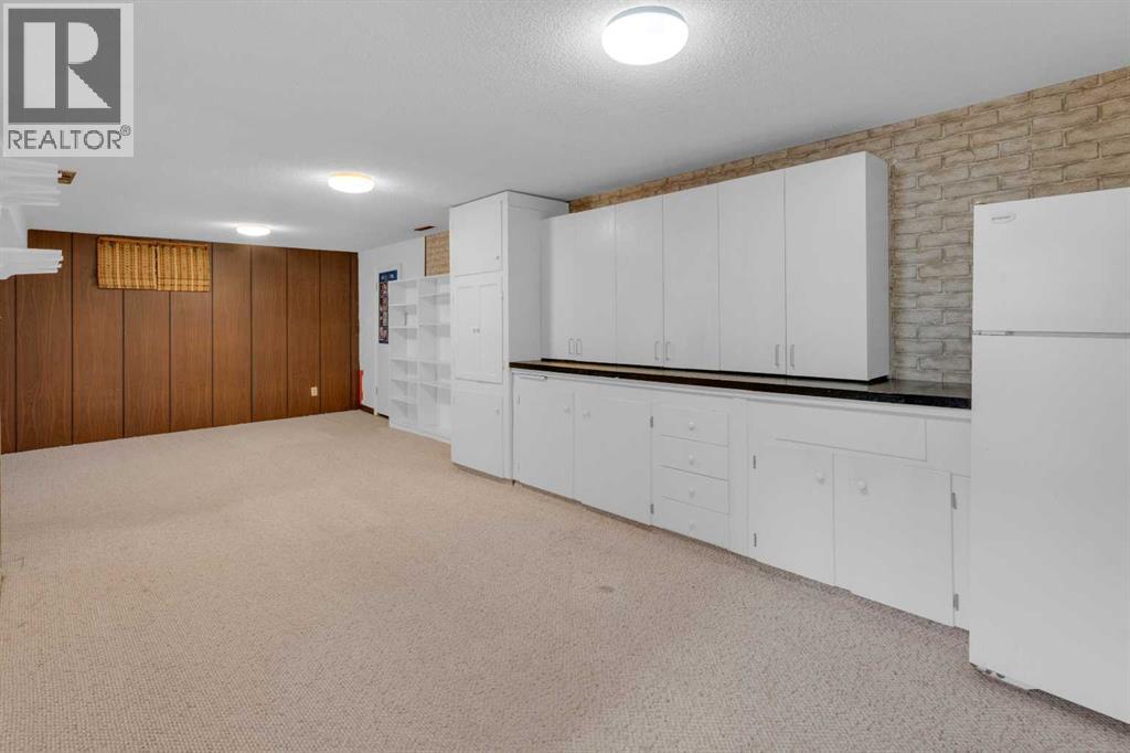 1031 Thorneycroft Drive NW, Calgary, Alberta  T2K 3K7 - Photo 21 - A2309461
