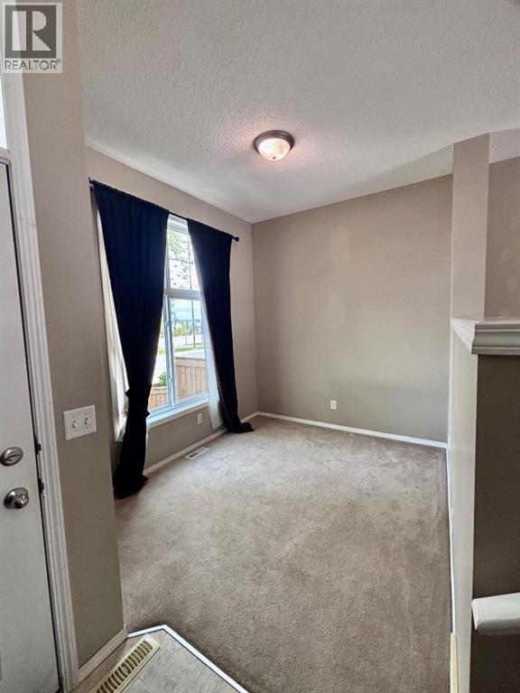 205 Mckenzie Towne Gate SE, Calgary, Alberta  T2Z 4G2 - Photo 6 - A2276192