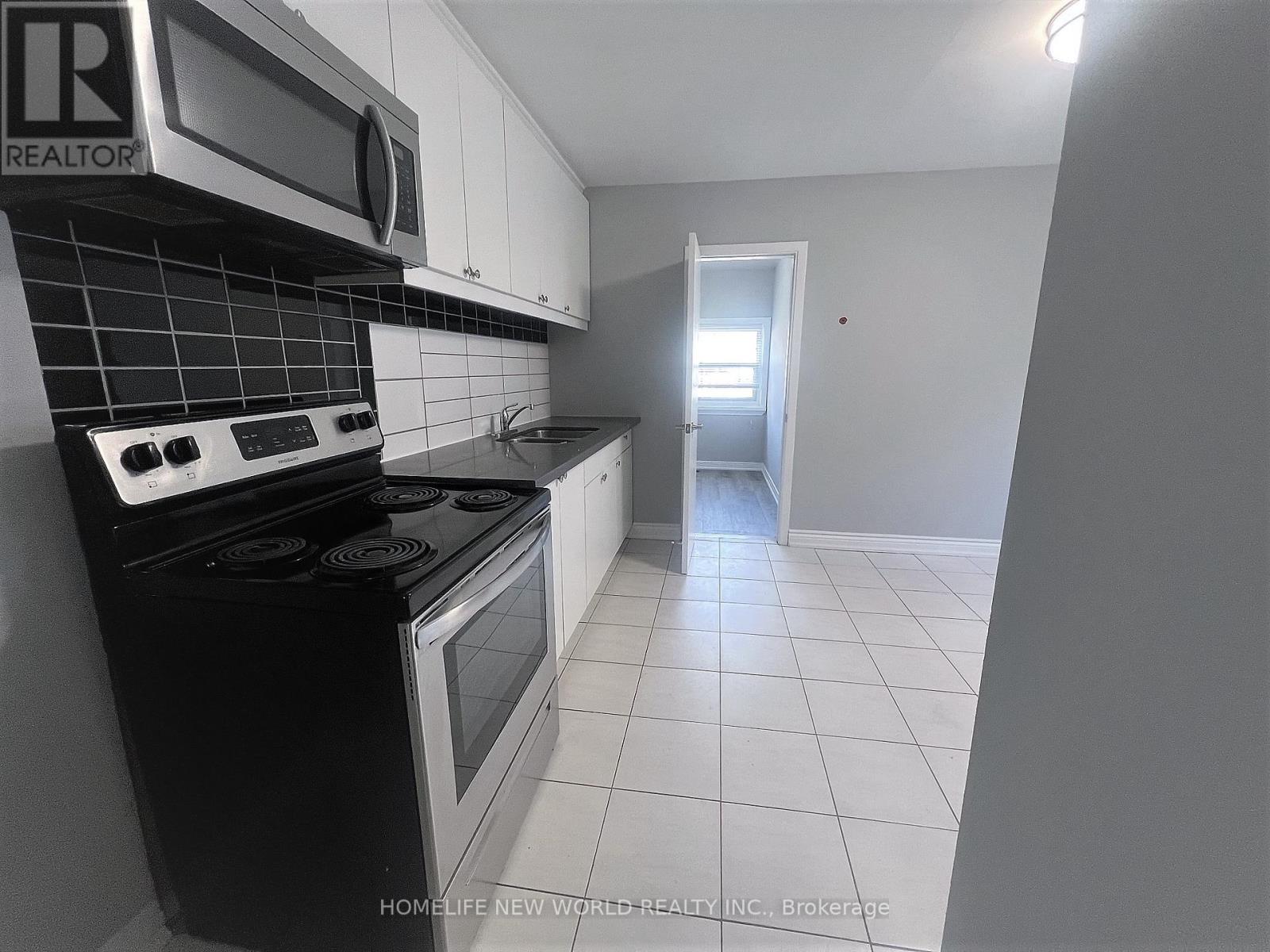 1 - 2 Thornton Avenue, Toronto, Ontario  M6E 2C9 - Photo 3 - W12909372