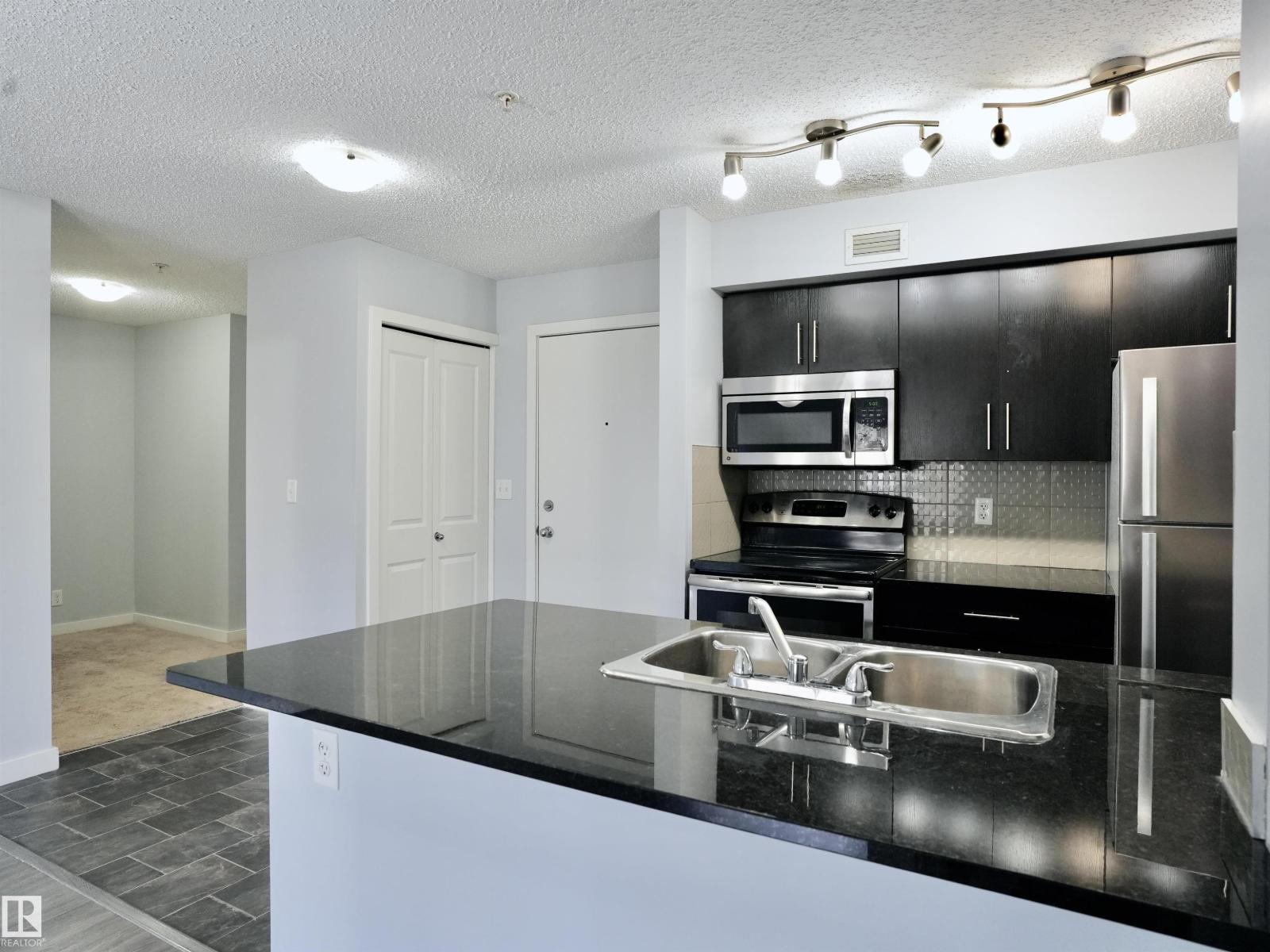 #320 5816 Mullen Pl NW, Edmonton, Alberta  T6R 0W3 - Photo 2 - E4489548
