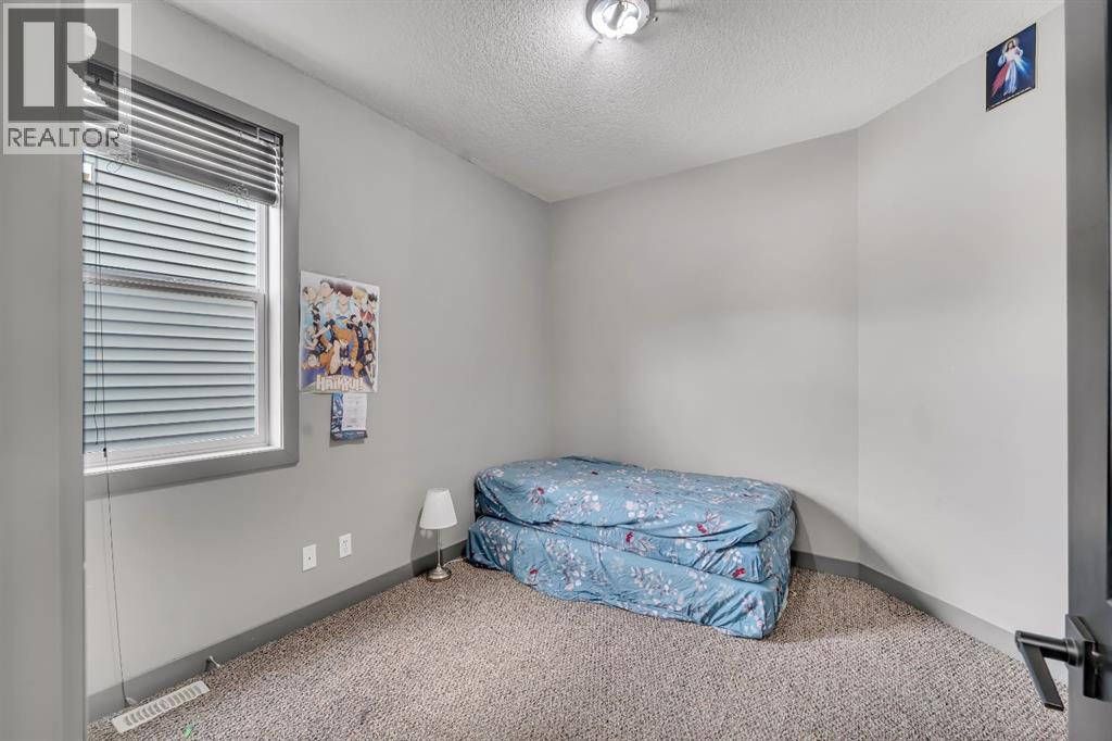 1200 Ravenswood Drive SE, Airdrie, Alberta  T4A 0G7 - Photo 12 - A2303089