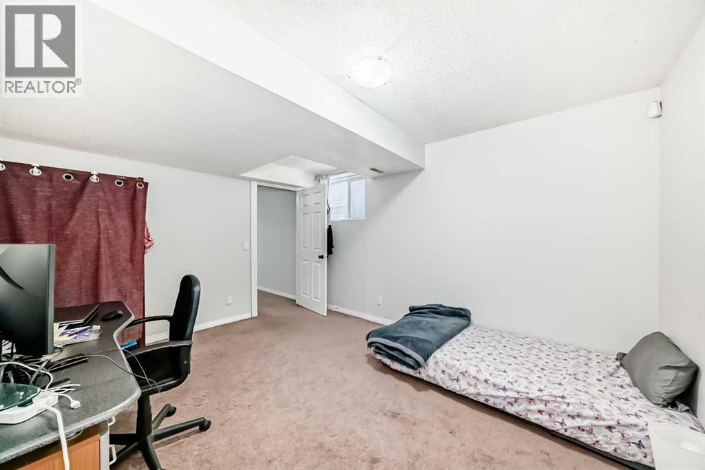 9275 Saddlebrook Drive NE, Calgary, Alberta  T3J 5M5 - Photo 20 - A2298694