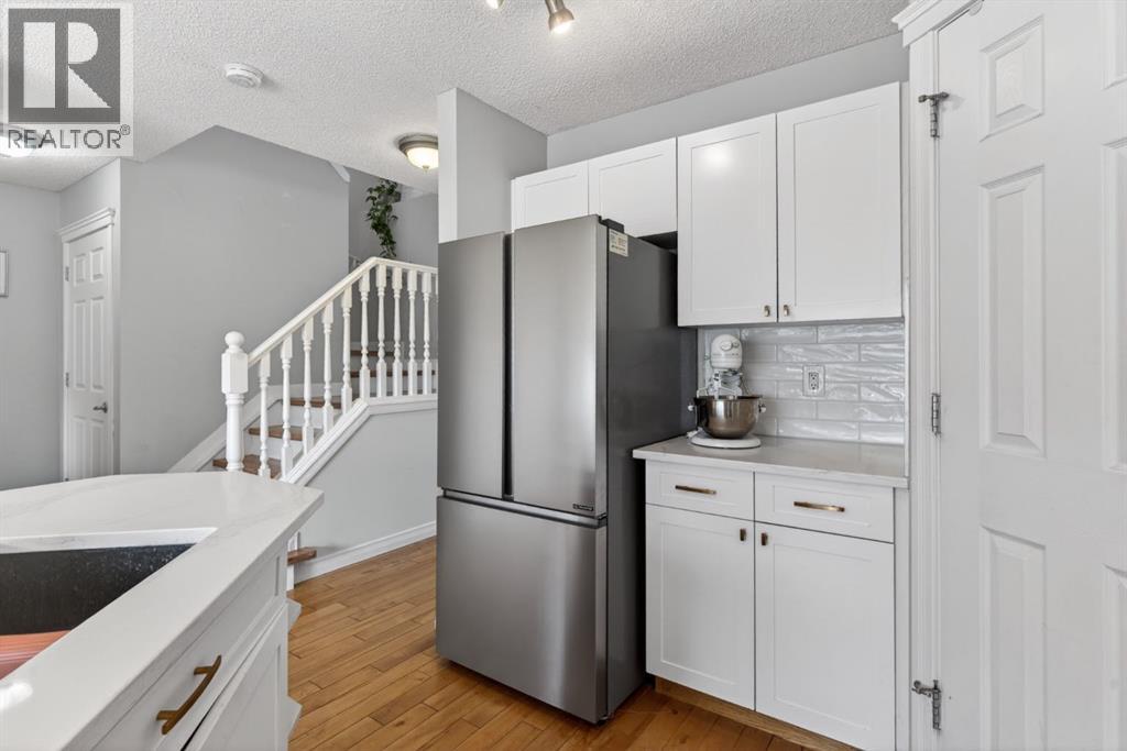 57 Bridlewood Manor Sw, Calgary, Alberta  T2Y 3T4 - Photo 12 - A2311048
