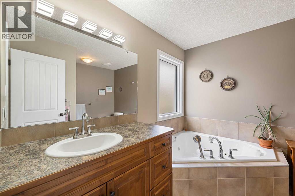 66 Sheep River Cove, Okotoks, Alberta  T1S 2L4 - Photo 23 - A2313157