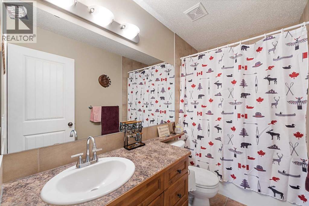 66 Sheep River Cove, Okotoks, Alberta  T1S 2L4 - Photo 27 - A2313157