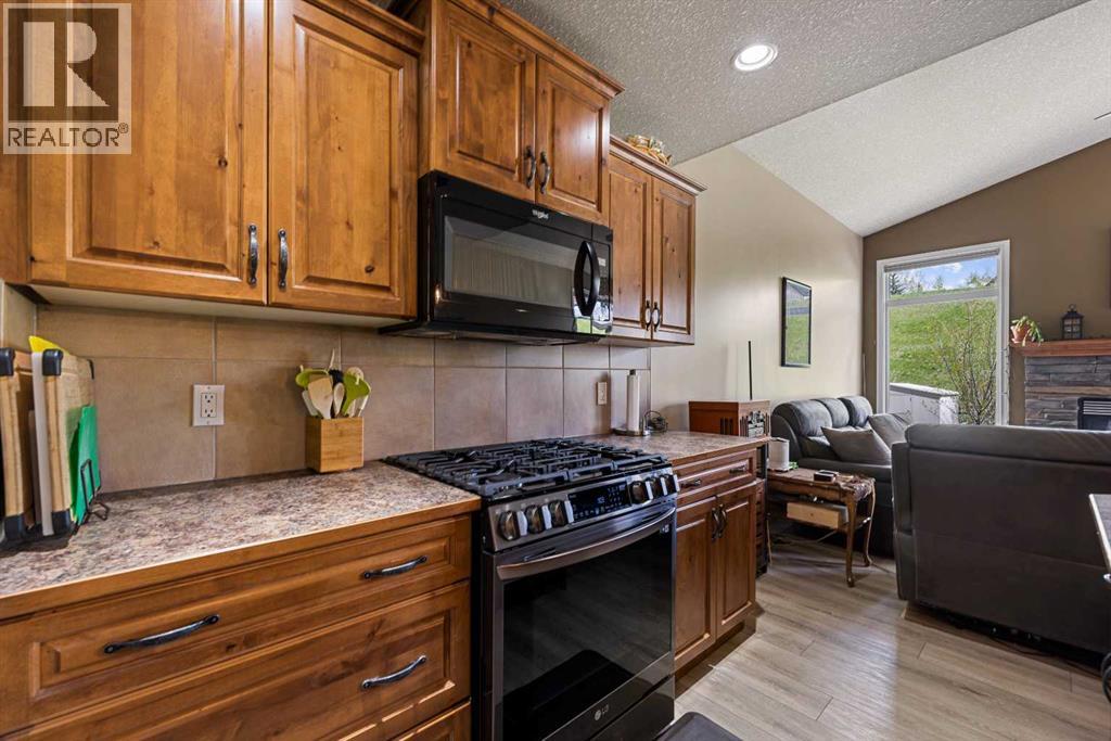 66 Sheep River Cove, Okotoks, Alberta  T1S 2L4 - Photo 11 - A2313157