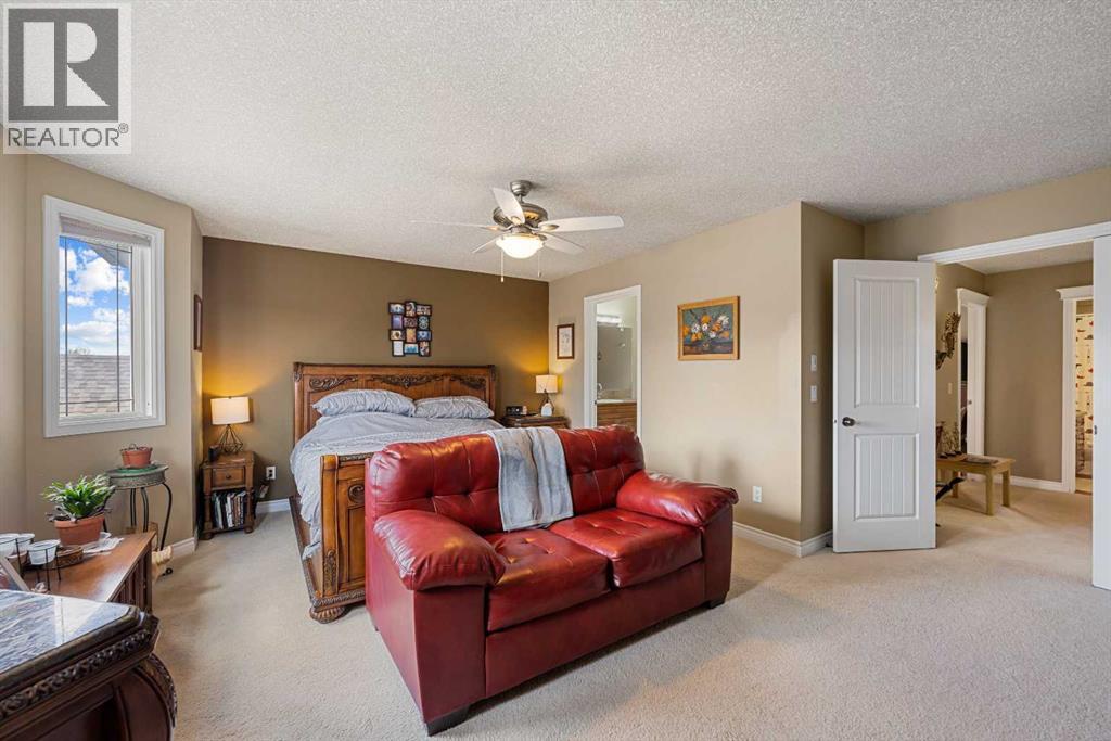 66 Sheep River Cove, Okotoks, Alberta  T1S 2L4 - Photo 21 - A2313157