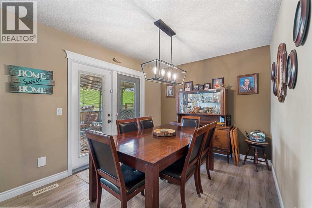 66 Sheep River Cove, Okotoks, Alberta  T1S 2L4 - Photo 5 - A2313157