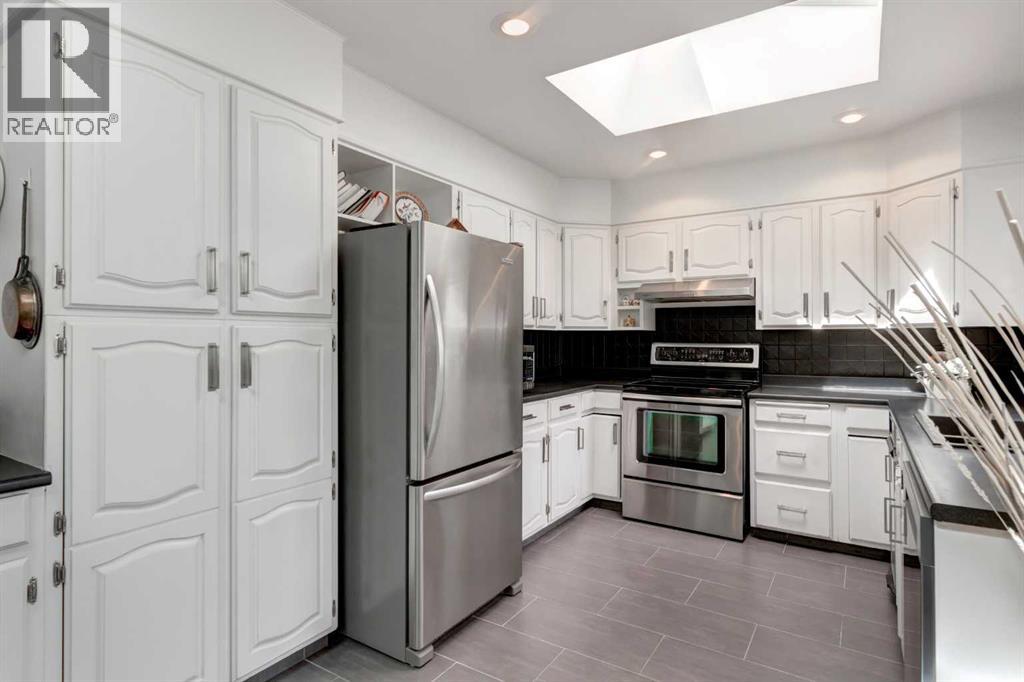 304 Lake Mead Crescent SE, Calgary, Alberta  T2J 3Z9 - Photo 8 - A2310803