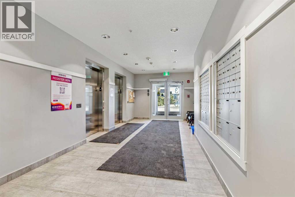 407, 370 Harvest Hills Common NE, Calgary, Alberta  T3K 2M8 - Photo 3 - A2304994