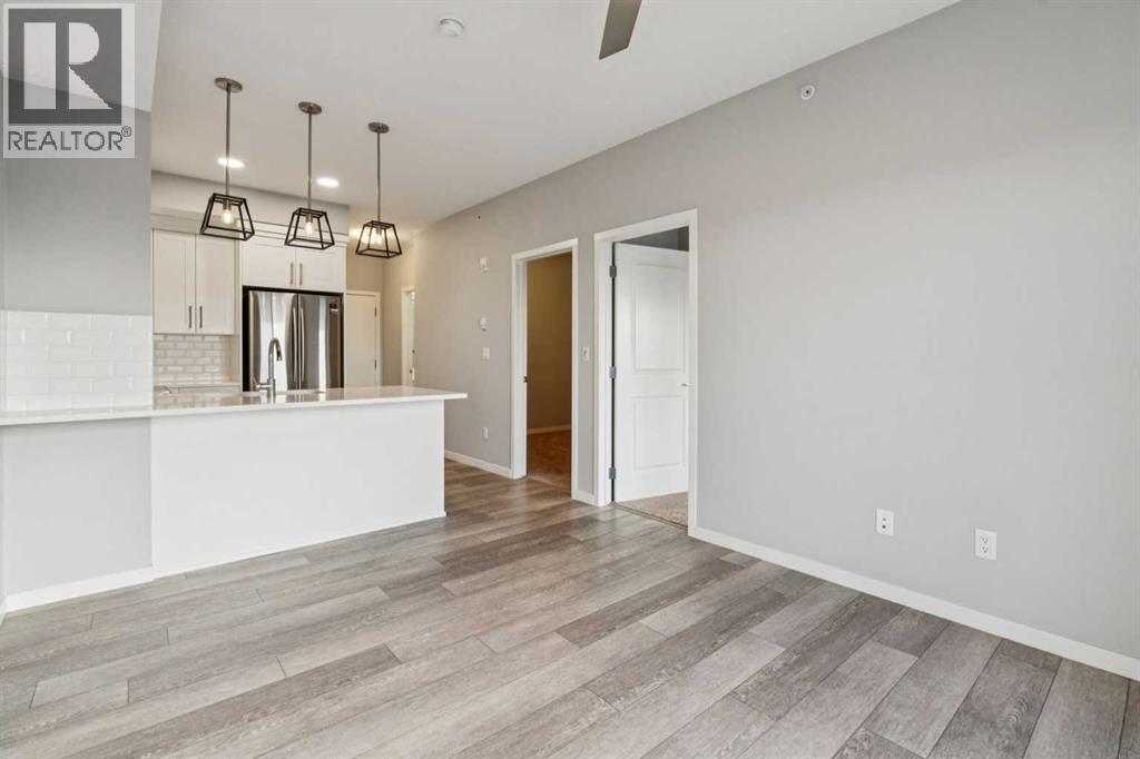 407, 370 Harvest Hills Common NE, Calgary, Alberta  T3K 2M8 - Photo 13 - A2304994