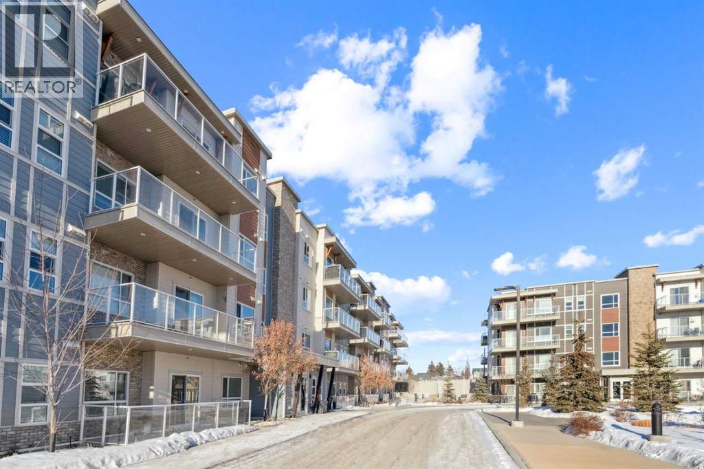 407, 370 Harvest Hills Common NE, Calgary, Alberta  T3K 2M8 - Photo 2 - A2304994