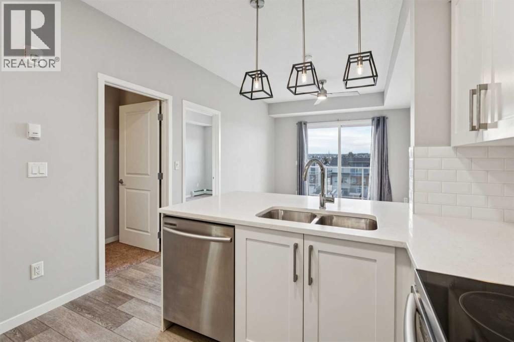 407, 370 Harvest Hills Common NE, Calgary, Alberta  T3K 2M8 - Photo 10 - A2304994