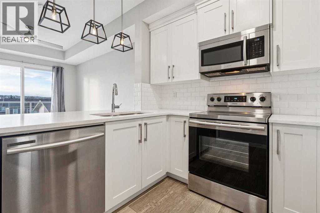 407, 370 Harvest Hills Common NE, Calgary, Alberta  T3K 2M8 - Photo 8 - A2304994