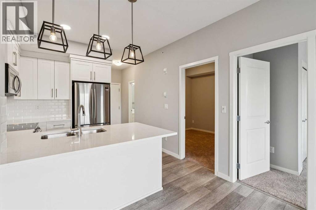 407, 370 Harvest Hills Common NE, Calgary, Alberta  T3K 2M8 - Photo 12 - A2304994