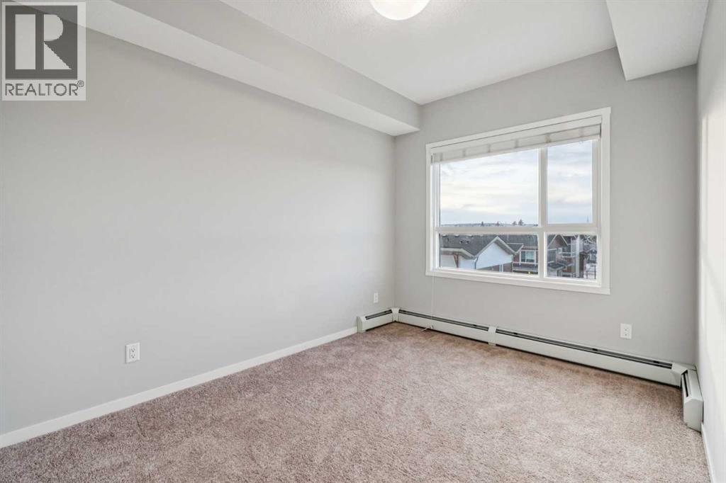 407, 370 Harvest Hills Common NE, Calgary, Alberta  T3K 2M8 - Photo 18 - A2304994