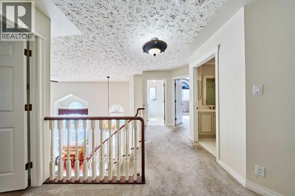 5740 Buckboard Road NW, Calgary, Alberta  T3A 4R6 - Photo 25 - A2311329
