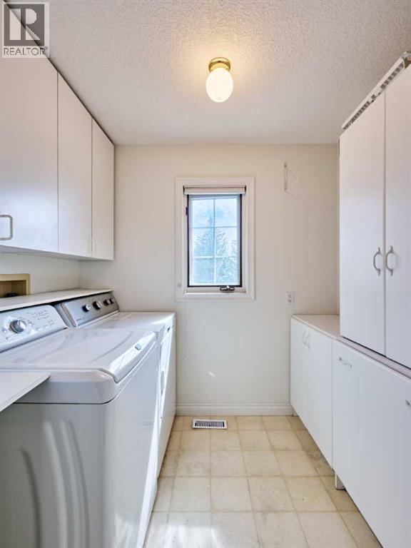 5740 Buckboard Road NW, Calgary, Alberta  T3A 4R6 - Photo 37 - A2311329